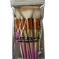 Makeup Brush Set - 7 pieces in gold and pink."