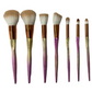 Makeup Brush Set - 7 pieces in gold and pink."